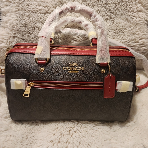 Coach Rowan - Picture 2 of 3